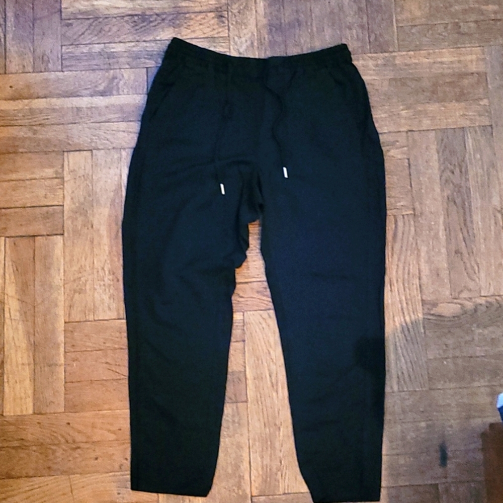 H&M ladies black drawstring rayon pants with pockets size 10